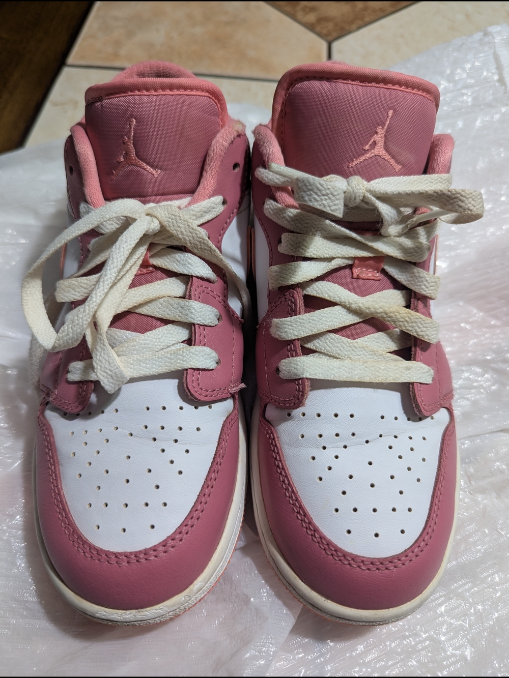 Pink and White Nike Air Jordan High-Top Sneakers